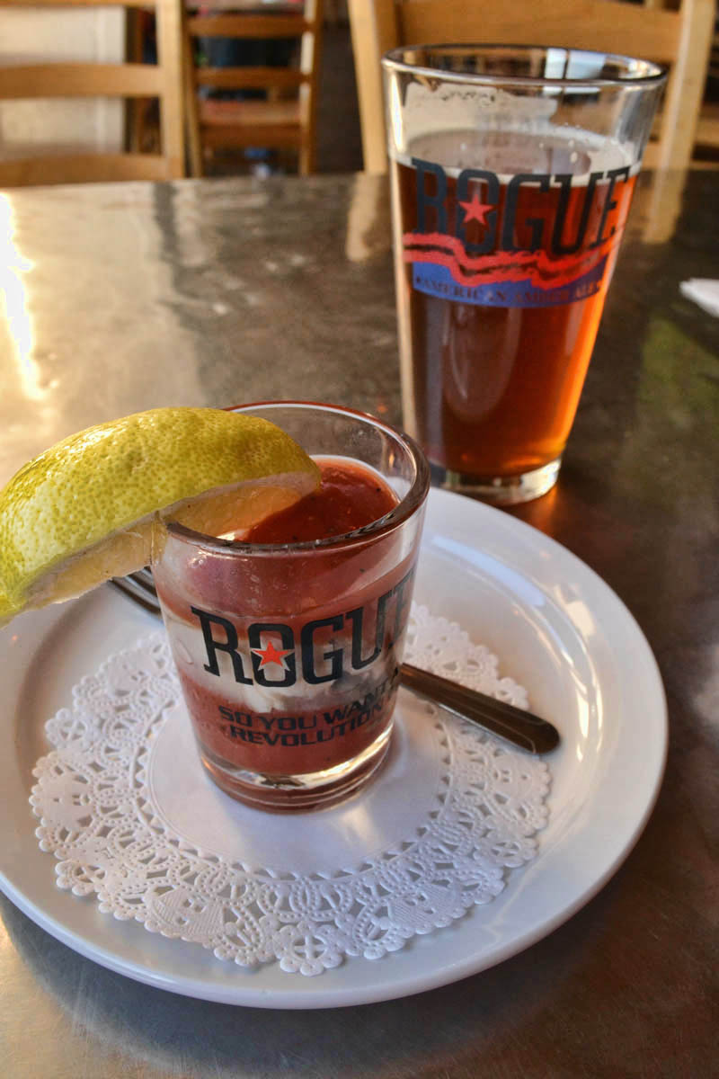 Oyster shooter with a splash of Rogue's Spruce Gin on top.