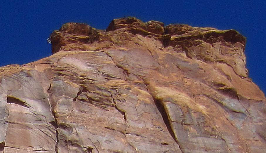 I zoom in to find him in upper left of photo on most difficult reverse pitch of climb.