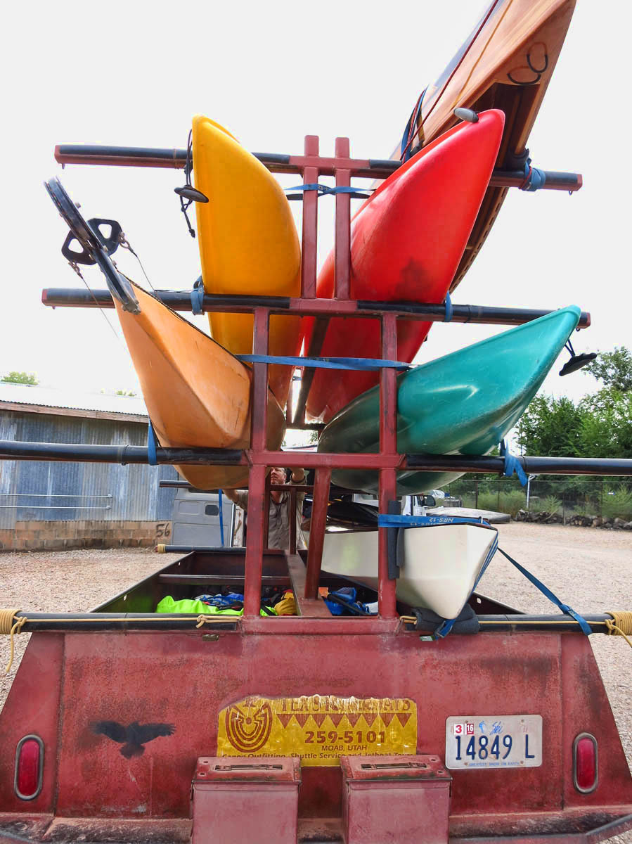 Loaded up and ready to go -- 3 "sit on top" Scupper Pros, one enclosed touring kayak, one wooden kayak hand crafted by Kathy, and one wooden canoe hand crafted by John.