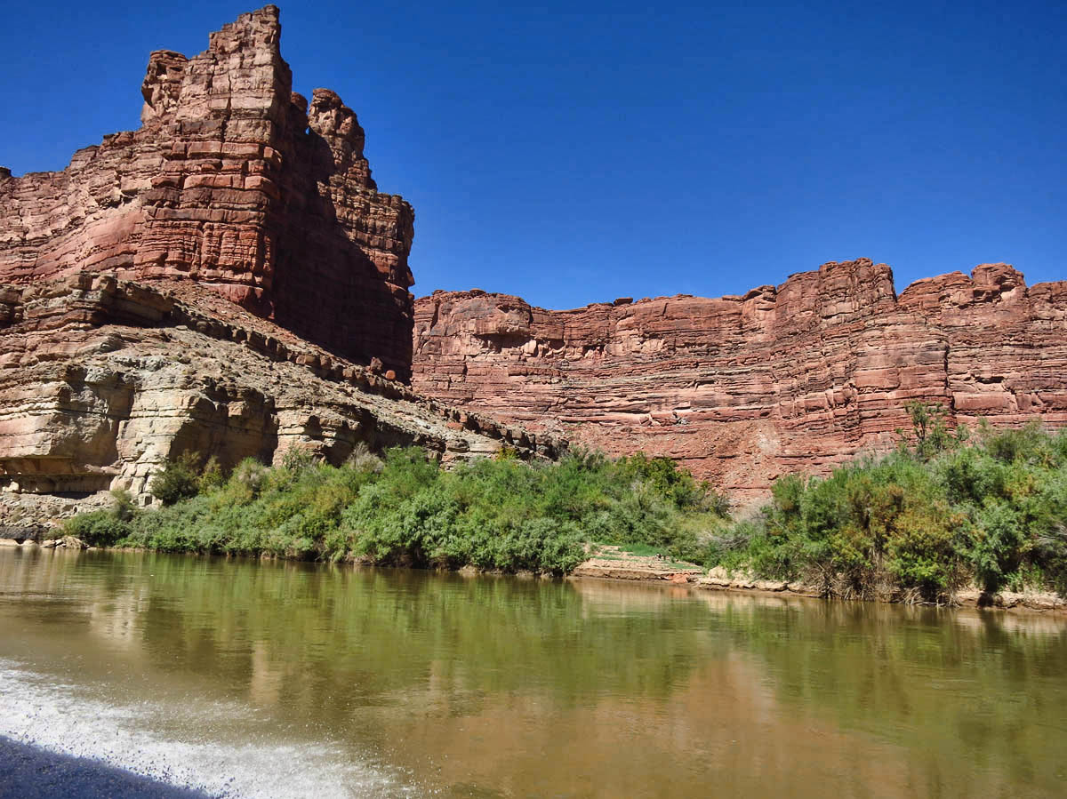 It is possible to kayak down the Colorado River side, but there is obviously much more motor traffic, as only NPS motorized craft are allowed on the Green.  
