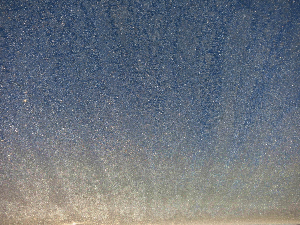 Sun through the ice crystals on my back window.