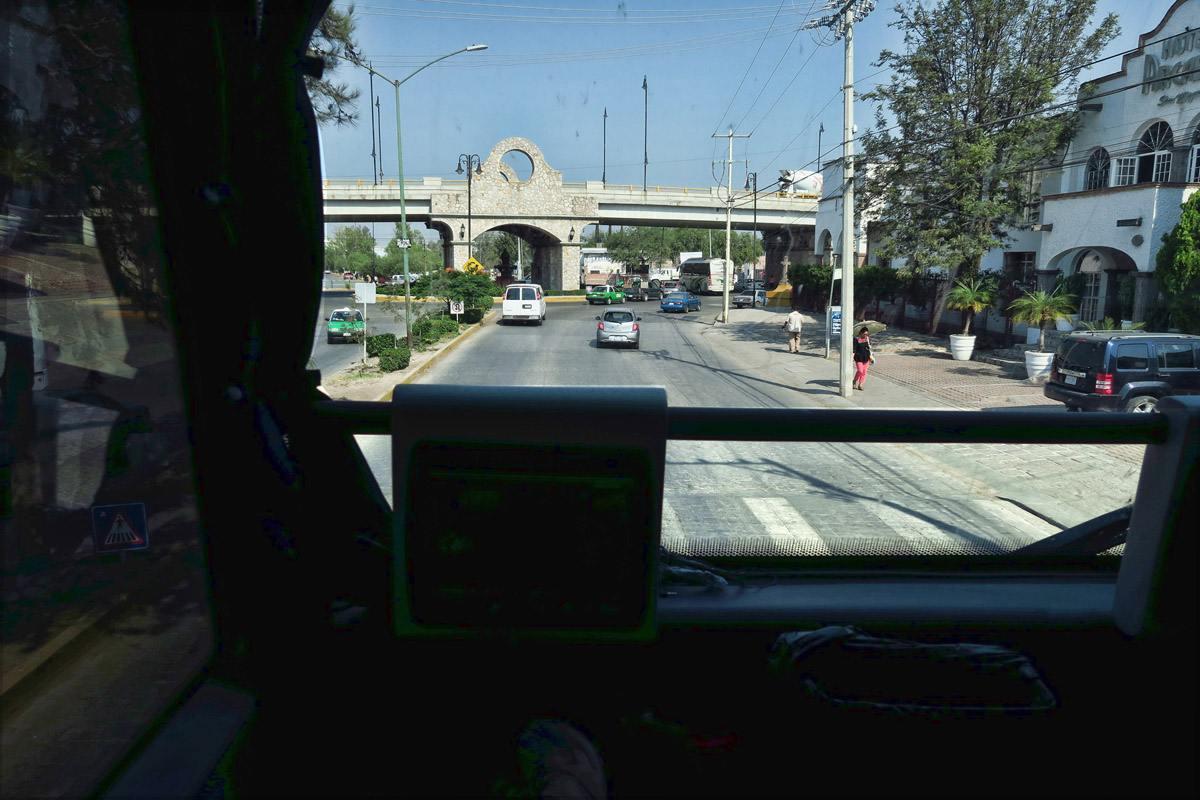 My favorite seat on the double-decker Mexican Luxury Bus, ETN, sitting right above the driver. Bound for Mexico City to catch a flight to DFW.