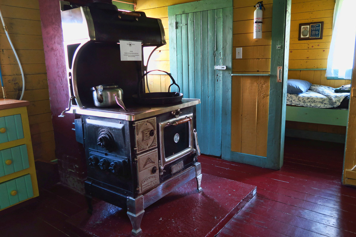 The cook, Walter Piercy lived and worked here for 30 years in this small room to the right. There is a plaque over the bed honoring his life, 1912 to 1972. 