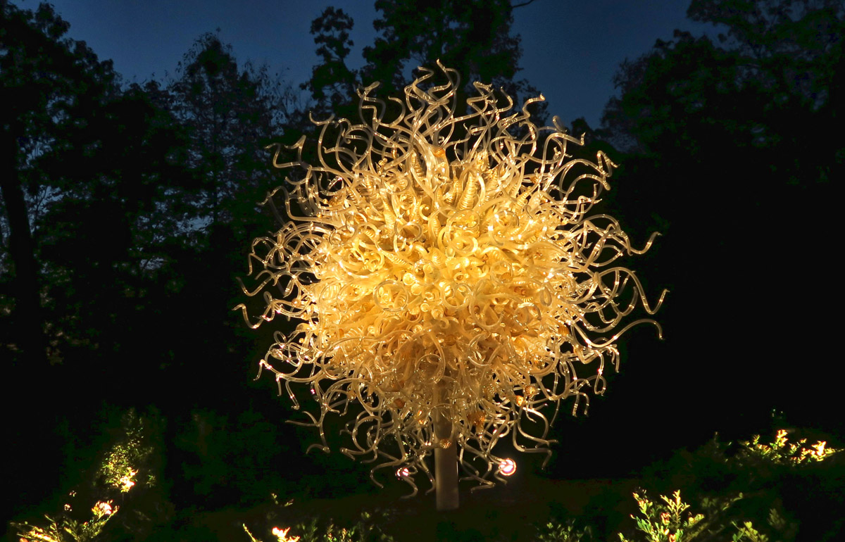 This one is called "Sole d'Oro" or "Golden Sun," and contains 1,300 hand blown pieces of glass and weighs over 5,000 lbs.