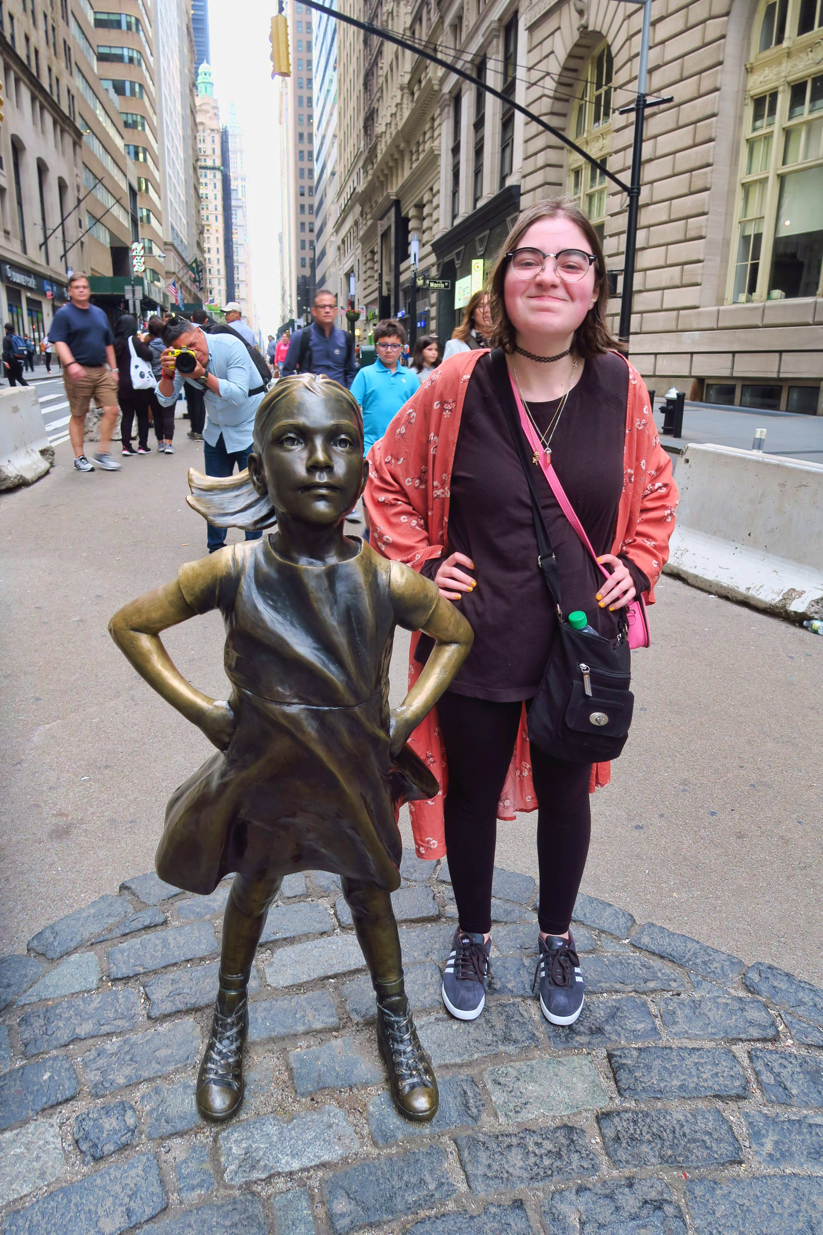 My fearless girl beside Wall Street's bronze "Fearless Girl."